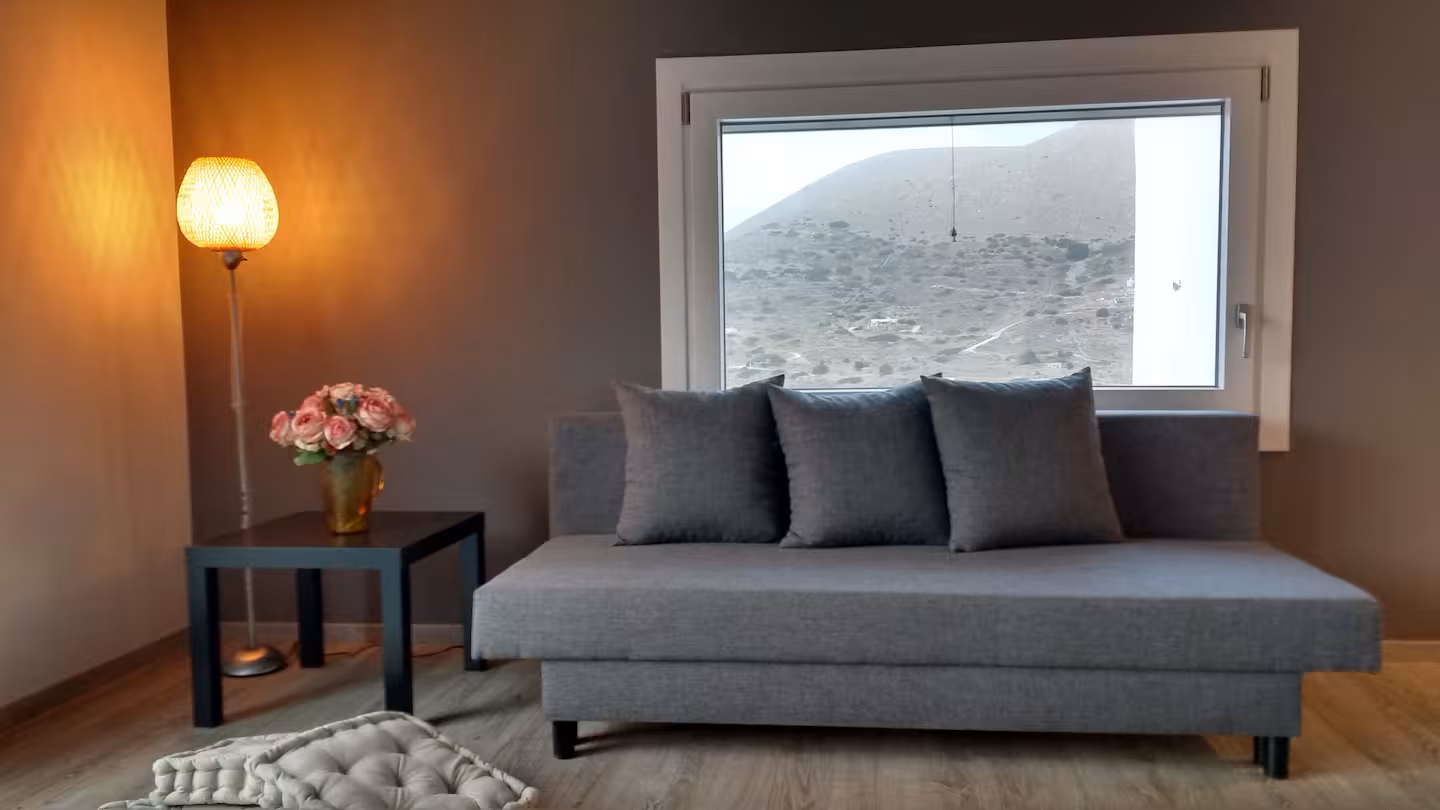 Silvermoon-luxury-house-syros-kini-cozy sofa which can be double bed
